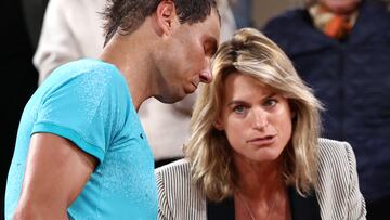 Spain's Rafael Nadal speaks with Roland-Garros Open tennis tournament's director Amelie Mauresmo (R) after his men's singles match against Germany's Alexander Zverev on Court Philippe-Chatrier on day two of the French Open tennis tournament at the Roland Garros Complex in Paris on May 27, 2024. (Photo by EMMANUEL DUNAND / AFP)