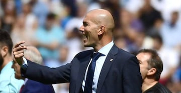 Real Madrid's French coach Zinedine Zidane gestures from the sideline during the Spanish Liga football match Real Madrid vs Levante at the Santiago Bernabeu stadium in Madrid on September 9, 2017