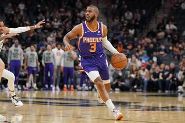 Jan 17, 2022; San Antonio, Texas, USA; Phoenix Suns guard Chris Paul (3) dribbles in the first half against the San Antonio Spurs at the AT&T Center. Mandatory Credit: Daniel Dunn-USA TODAY Sports