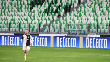 (FILES) In this file photo taken on March 08, 2020 Juventus' Portuguese forward Cristiano Ronaldo runs on the pitch in an empty stadium due to the novel coronavirus outbreak during the Italian Serie A football match Juventus vs Inter Milan, at the Ju