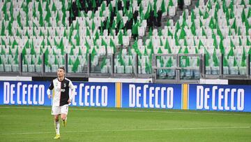 (FILES) In this file photo taken on March 08, 2020 Juventus&#039; Portuguese forward Cristiano Ronaldo runs on the pitch in an empty stadium due to the novel coronavirus outbreak during the Italian Serie A football match Juventus vs Inter Milan, at the Ju