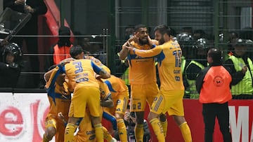 Tigres' Uruguayan midfielder #08 Fernando Gorriaran (unseen) celebrates with teammates after scoring his team's first goal during the Liga MX Apertura final second leg football match between Toluca and Tigres at the Nemesio Diez stadium in Toluca, Mexico on December 14, 2025. (Photo by Yuri CORTEZ / AFP)