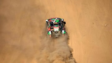 Saudi driver Yazeed Al Rajhi and co driver Timo Gottschalk compete in Stage 1 of the Dakar Rally 2025, between Bisha and Bisha, Saudi Arabia, on January 4, 2025. (Photo by Valery HACHE / AFP)