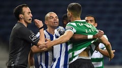 Porto&#039;s Portuguese defender Pepe (C) argues with Sporting Lisbon&#039;s Moroccan defender Zou during the Portuguese league football match between FC Porto and Sporting CP at the Dragao stadium in Porto on February 27, 2021. (Photo by MIGUEL RIOPA / A