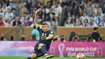 LUSAIL CITY, QATAR - DECEMBER 18: Kylian Mbappe scores the equalizer at the end of the FIFA World Cup Qatar 2022 Final match between Argentina and France at Lusail Stadium on December 18, 2022 in Lusail City, Qatar. (Photo by Lionel Hahn/Getty Images)