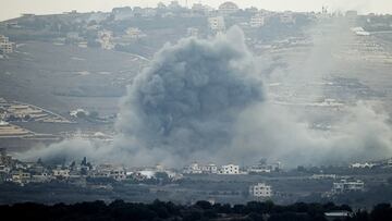 Smoke billows after an Israeli Air Force air strike on a village in southern Lebanon, amid cross-border hostilities between Hezbollah and Israel, as seen from northern Israel October 1, 2024. REUTERS/Jim Urquhart