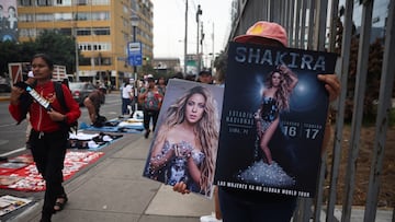 Vendors sell merchandise before pop star Shakira's concert at the National Stadium, a day after the singer cancelled a show due to being hospitalized, in Lima, Peru, February 17, 2025. REUTERS/Sebastian Castaneda