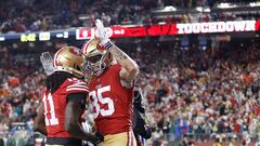 SANTA CLARA, CALIFORNIA - JANUARY 20: George Kittle #85 of the San Francisco 49ers celebrates with Brandon Aiyuk #11 after scoring a 32-yard touchdown during the second quarter against the Green Bay Packers in the NFC Divisional Playoffs at Levi's Stadium on January 20, 2024 in Santa Clara, California.   Lachlan Cunningham/Getty Images/AFP (Photo by Lachlan Cunningham / GETTY IMAGES NORTH AMERICA / Getty Images via AFP)