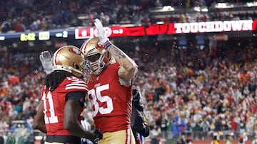 SANTA CLARA, CALIFORNIA - JANUARY 20: George Kittle #85 of the San Francisco 49ers celebrates with Brandon Aiyuk #11 after scoring a 32-yard touchdown during the second quarter against the Green Bay Packers in the NFC Divisional Playoffs at Levi's Stadium on January 20, 2024 in Santa Clara, California.   Lachlan Cunningham/Getty Images/AFP (Photo by Lachlan Cunningham / GETTY IMAGES NORTH AMERICA / Getty Images via AFP)