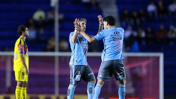 Soccer Football - Liga MX - Club America v Puebla - Estadio Azteca, Mexico City, Mexico - October 21, 2025 Puebla's Emiliano Gomez celebrates scoring their first goal with Luis Gabriel Rey REUTERS/Eloisa Sanchez
