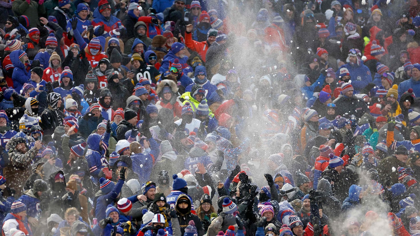 Why is Buffalo's fan base called 'Bills Mafia' and why do they jump on tables? - AS USA