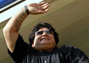 Diego Armando Maradona supporting Boca Juniors at La Bombonera.