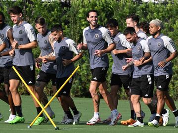 Messi was all smiles as he met his new teammates.