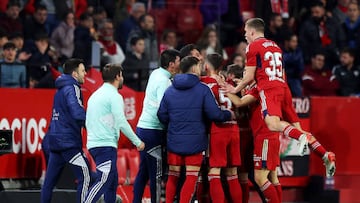 SEVILLE, SPAIN - FEBRUARY 26: Kike Barja of CA Osasuna celebrates with teammates after their shot is deflected into the goal by Fernando of Sevilla FC ( not pictured ), leading to the second goal for CA Osasuna, during the LaLiga Santander match between Sevilla FC and CA Osasuna at Estadio Ramon Sanchez Pizjuan on February 26, 2023 in Seville, Spain. (Photo by Fran Santiago/Getty Images)