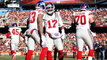 CLEVELAND, OH - NOVEMBER 27: Dwayne Harris #17 of the New York Giants celebrates his touchdown catch with Odell Beckham #13 during the second quarter against the New York Giants at FirstEnergy Stadium on November 27, 2016 in Cleveland, Ohio.   Gregory Shamus/Getty Images/AFP
 == FOR NEWSPAPERS, INTERNET, TELCOS &amp; TELEVISION USE ONLY ==