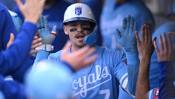 SAN DIEGO, CALIFORNIA - JUNE 20: Bobby Witt Jr. #7 of the Kansas City Royals is congratulated in the dugout after hitting a home run against the San Diego Padres during the first inning at Petco Park on June 20, 2025 in San Diego, California. Orlando Ramirez/Getty Images/AFP (Photo by Orlando Ramirez / GETTY IMAGES NORTH AMERICA / Getty Images via AFP)