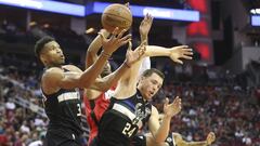 Oct 24, 2019; Houston, TX, USA; Milwaukee Bucks forward Giannis Antetokounmpo (34) reaches for a rebound against Houston Rockets in the second half at Toyota Center. Mandatory Credit: Thomas B. Shea-USA TODAY Sports