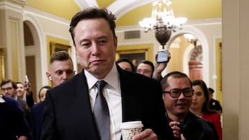 Elon Musk walks on Capitol Hill on the day of a meeting with Senate Republican Leader-elect John Thune (R-SD), in Washington, U.S. December 5, 2024. REUTERS/Benoit Tessier