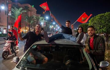 Locals celebrate in Marrakech after Morocco's victory over Ivory Coast in their FIFA 2018 World Cup Play-Off.