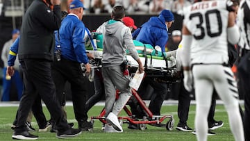 (FILES) In this file photo taken on September 29, 2022, medical staff tend to quarterback Tua Tagovailoa, #1 of the Miami Dolphins, as he is carted off on a stretcher after an injury during the 2nd quarter of the game against the Cincinnati Bengals at Paycor Stadium in Cincinnati, Ohio. - Miami Dolphins quarterback Tua Tagovailoa, whose medical health is the subject of an NFL investigation, will miss next Sunday's game against the New York Jets due to a concussion. (Photo by Dylan Buell / GETTY IMAGES NORTH AMERICA / AFP)