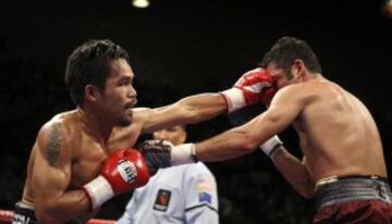 Pacquiao consigui¨® el campeonato de peso ligero de la CMB y se convirti¨® as¨ª en el ¨²nico boxeador filipino y asi¨¢tico en ganar cuatro t¨ªtulos importantes en cuatro niveles de peso. En 2008 se enfrent¨® a ?scar de la Hoya en la llamada Dream Match (pelea de ensue?o) en el que domin¨® totalmente el filipino.