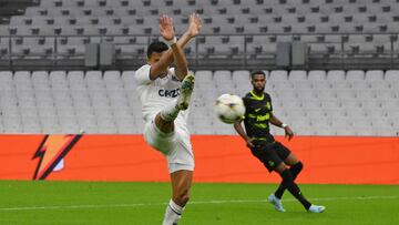 Marseille's Chilean forward Alexis Sanchez scores his team's first goal during the UEFA Champions League group D, football match between Olympique Marseille (OM) and Sporting Lisbon at the Stade Velodrome on October 4, 2022. (Photo by NICOLAS TUCAT / AFP)