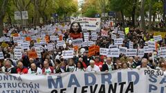 Demonstrators march during a demonstration called by citizens under the slogan "Madrid stands up for its public health. Against the destruction of primary health care" in Madrid on November 13, 2022. (Photo by OSCAR DEL POZO / AFP) (Photo by OSCAR DEL POZO/AFP via Getty Images)