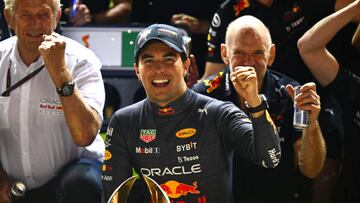 SINGAPORE, SINGAPORE - OCTOBER 02: Race winner Sergio Perez of Mexico and Oracle Red Bull Racing celebrates with his team after the F1 Grand Prix of Singapore at Marina Bay Street Circuit on October 02, 2022 in Singapore, Singapore. (Photo by Clive Mason/Getty Images,)