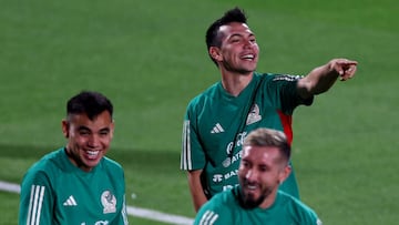 DOHA, QATAR - NOVEMBER 19: Hirving Lozano #22 of Team Mexico smiles a training session for Team Mexico at Al Khor Stadium on November 19, 2022 in Doha, Qatar. (Photo by Elsa/Getty Images)