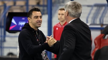 Xavi Hernandezy Carlo Ancelotti