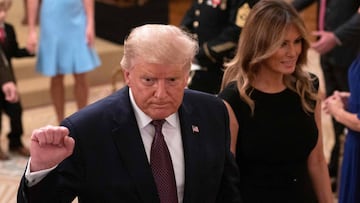 US President Donald Trump and First Lady Melania Trump leave after presenting the Medal of Honor to US Army Sergeant Major Thomas Payne, for conspicuous gallantry while serving in Iraq, in a ceremony in the East Room of the White House in Washington, DC o