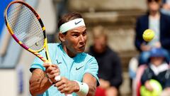 Spain's Rafael Nadal returns the ball as he plays with Norway's Casper Ruud during the men's doubles tennis match against Argentina's Guido Andreozzi and Mexico's Miguel Reyes-Varela during the Nordea Open ATP tennis tournament in Bastad, Sweden, on July 15, 2024. Rafael Nadal teams up with Casper Ruud in the doubles at the ATP Bastad Open, Sweden, where he is also playing singles as part of his preparations for the Paris Olympics. (Photo by Adam IHSE / TT News Agency / AFP) / Sweden OUT