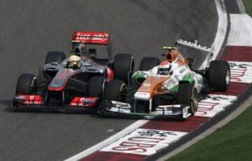 Golpe entre el piloto de McLaren Sergio Perez y Adrian Sutil de Force India.