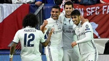 Asensio (right) is congratulated by Marcelo, Casemiro (second left) and Álvaro Morata (second right) after his UEFA Super Cup goal.