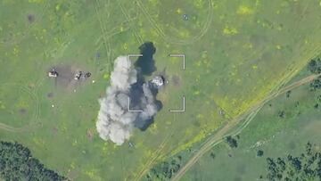 Drone footage shows a burning armoured vehicle in an unidentified location after the Defence Ministry in Moscow said that Russian forces have thwarted a major Ukrainian offensive in the southern Ukrainian region of Donetsk, in this still image taken from a handout video released June 5, 2023. Russian Defence Ministry/Handout via REUTERS ATTENTION EDITORS - THIS IMAGE WAS PROVIDED BY A THIRD PARTY. NO RESALES. NO ARCHIVES. MANDATORY CREDIT.