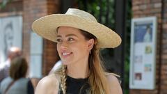 Amber Heard still signing autographs for fans while settling into life in Spain