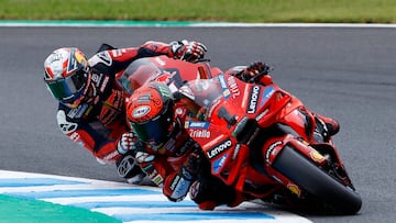 MotoGP - Japanese Grand Prix - Mobility Resort Motegi, Motegi, Japan - October 5, 2024 Ducati Lenovo Team's Francesco Bagnaia and Red Bull GASGAS Tech3's Pedro Acosta in action during the sprint race REUTERS/Kim Kyung-Hoon