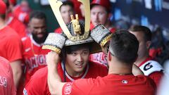 Jun 17, 2023; Kansas City, Missouri, USA; A member of the Los Angeles Angels removes the Samurai hat from designated hitter Shohei Ohtani (17) after Ohtani hit a home run during the seventh inning against the Kansas City Royals at Kauffman Stadium. Mandatory Credit: Scott Sewell-USA TODAY Sports