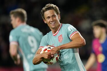El lateral del Atlético Marcos Llorente celebra su gol, el tercero del Atlético de Madrid 