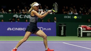 Tennis - WTA Tour Finals - Singapore Indoor Stadium, Singapore - October 25, 2017   Denmark&#039;s Caroline Wozniacki in action during her group stage match with Romania&#039;s Simona Halep   REUTERS/Jeremy Lee