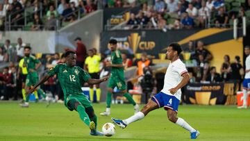 AUSTIN, TEXAS - JUNE 19: Tyler Adams #4 of the United States defends against Saud Abdulhamid #12 of Saudi Arabia during a 2025 CONCACAF Gold Cup Group D match at Q2 Stadium on June 19, 2025 in Austin, Texas. Noah Goldberg/Getty Images/AFP (Photo by Noah Goldberg / GETTY IMAGES NORTH AMERICA / Getty Images via AFP)