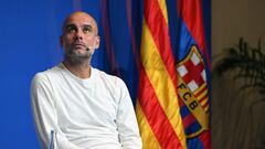Manchester City's Spanish manager Pep Guardiola attends the presentation of the friendly match between FC Barcelona and Manchester City at Camp Nou stadium, in Barcelona, on June 20, 2022. - The friendly match will be held as a benefit event for the Amyotrophic Lateral Sclerosis Foundation in Barcelona, on August 24, 2022. (Photo by LLUIS GENE / AFP)