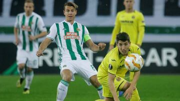 Soccer Football - Europa League - Group Stage - Group G - SK Rapid Wien v Villarreal - Allianz Stadion, Vienna, Austria - November 8, 2018 Rapid Wien's Stefan Schwab in action with Villarreal's Santiago Caseres REUTERS/Heinz-Peter Bader
