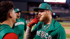 PHOENIX, ARIZONA - MARCH 10: Alex Verdugo #27 of Team Mexico points to his teeth during a workout before the start of the World Baseball Classic at Chase Field on March 10, 2023 in Phoenix, Arizona.   Chris Coduto/Getty Images/AFP (Photo by Chris Coduto / GETTY IMAGES NORTH AMERICA / Getty Images via AFP)