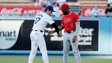 LOS ANGELES, CALIFORNIA - JUNE 21: Shohei Ohtani #17 of the Los Angeles Dodgers greets former teammate Jo Adell #7 of the Los Angeles Angels before the game at Dodger Stadium on June 21, 2024 in Los Angeles, California.   Kevork Djansezian/Getty Images/AFP (Photo by KEVORK DJANSEZIAN / GETTY IMAGES NORTH AMERICA / Getty Images via AFP)