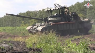 Russian service members drive a tank in the area bordering Ukraine in the Kursk region, Russia, in this still image from video released August 10, 2024. Russian Defence Ministry/Handout via REUTERS ATTENTION EDITORS - THIS IMAGE HAS BEEN SUPPLIED BY A THIRD PARTY. NO RESALES. NO ARCHIVES. MANDATORY CREDIT. WATERMARK AND GRAPHICS FROM SOURCE.