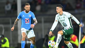 Carlos Rotondi (C) of Cruz Azul fights for the ball with James Rodriguez (R) of Leon during the Quarter-Final second leg match between Cruz Azul and Leon as part of the Liga BBVA MX, Torneo Clausura 2025 at Olimpico Universitario Stadium on May 11, 2025 in Mexico City, Mexico.