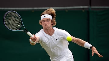 Russia's Andrey Rublev in action during a Wimbledon fourth round match against Hungary's Marton Fucsovics.