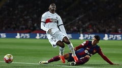 Paris Saint-Germain's French forward #10 Ousmane Dembele reacts next to Barcelona's Portuguese defender #02 Joao Cancelo during the UEFA Champions League quarter-final second leg football match between FC Barcelona and Paris SG at the Estadi Olimpic Lluis Companys in Barcelona on April 16, 2024. (Photo by FRANCK FIFE / AFP)