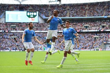 Raheem Sterling fires Man City ahead. Min.13